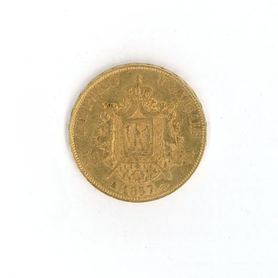 a gold coin with a coat of arms on it