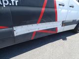 a black and white van with a red stripe on the side of it