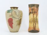 two vases sitting side by side on a white surface