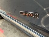 a close up of a sticker on the side of a car