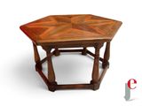 a wooden table with a geometric design on it