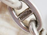 a close up of a silver chain with a clasp on it