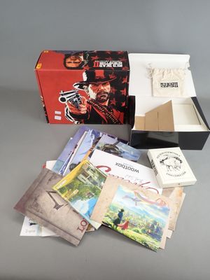 the contents of a box of cards and a box of books