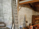 a ladder leaning up against a wall in a room