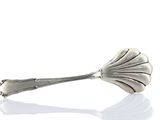 a spoon that is sitting on top of a table