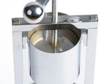 a silver machine that is sitting on top of a table