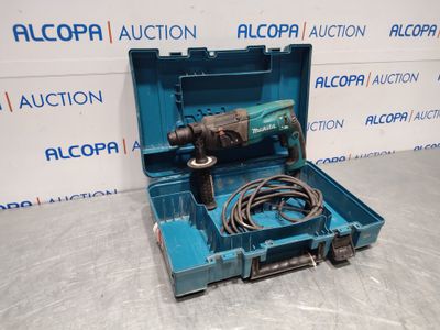 a close up of a tool in a blue case on a table