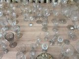 a lot of empty wine glasses on the table