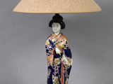 an image of a lamp with a woman in a kimono outfit on it