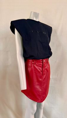 red leather skirt with black shirt on mannequin mannequin mannequin mannequin mannequin mannequin mannequin mannequin mann