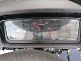 a close up of a speedometer on a motorcycle