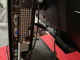 a computer that is sitting on a red table