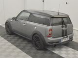 a small car that is parked in a garage