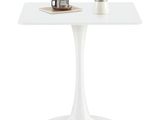 a white table with a coffee pot on top of it