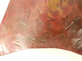 a close up of a piece of art on a table