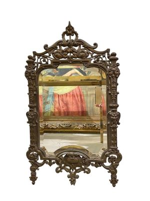Petit miroir en bronze à décor de sphinges, mascarons, frise…