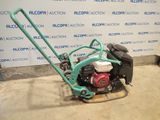 an image of a lawn mower in a garage