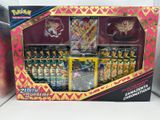 a box of pokemon cards in it on a table