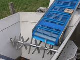 an image of a conveyor belt being loaded onto a truck