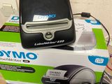 a black and silver cell phone sitting on top of a box