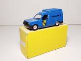 a blue toy truck sitting on top of a yellow box