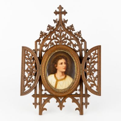 an antique picture frame with a painting of a woman in a white dress