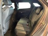 the back seats of a car are empty and the passenger seat is empty