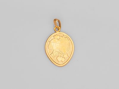 une pièce d'or portant un visage de femme
