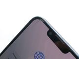 an image of a close up of a cell phone with a logo on the screen