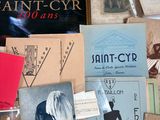 many books that are on a table together