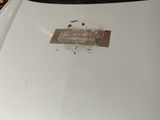 a picture of a sticker on the hood of a car