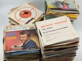 a lot of records stacked on top of each other