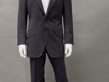 an image of a mannequin dressed in a black suit and white shirt