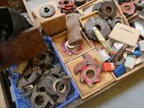 a box full of assorted tools sitting on the floor