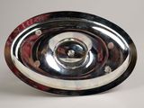 a silver plate with a hole in the middle of it