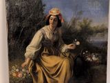 tableau représentant une femme en robe jaune assise dans un champ de fleurs