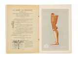 un livre ouvert sur lequel figurent le dessin d'une jambe humaine et la photo d'une plante