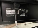 a close up of a cable connected to a computer monitor