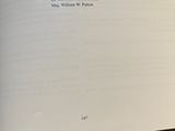 an open book with a picture of a cat on it