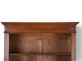 an image of a wooden bookcase with two doors and a shelf