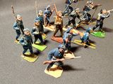 a lot of figurines that are on a table