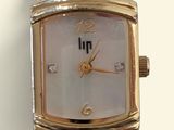 an image of a close up of a wrist watch with diamonds on it