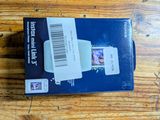 a box with a picture on it sitting on a wooden table