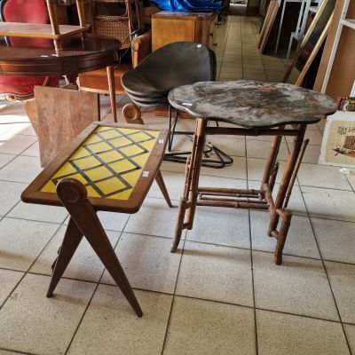 a small table and two chairs in a room