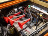 a car battery in the trunk of a vehicle