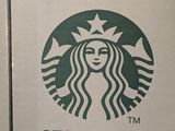 a starbucks logo on the side of a white box