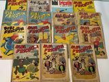 a lot of comic books that are on the table