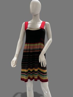 a mannequin wearing a multicolored dress on a mannequin