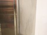 an image of a stainless steel refrigerator in a kitchen