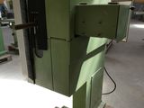 a machine that is sitting on a pallet in a warehouse